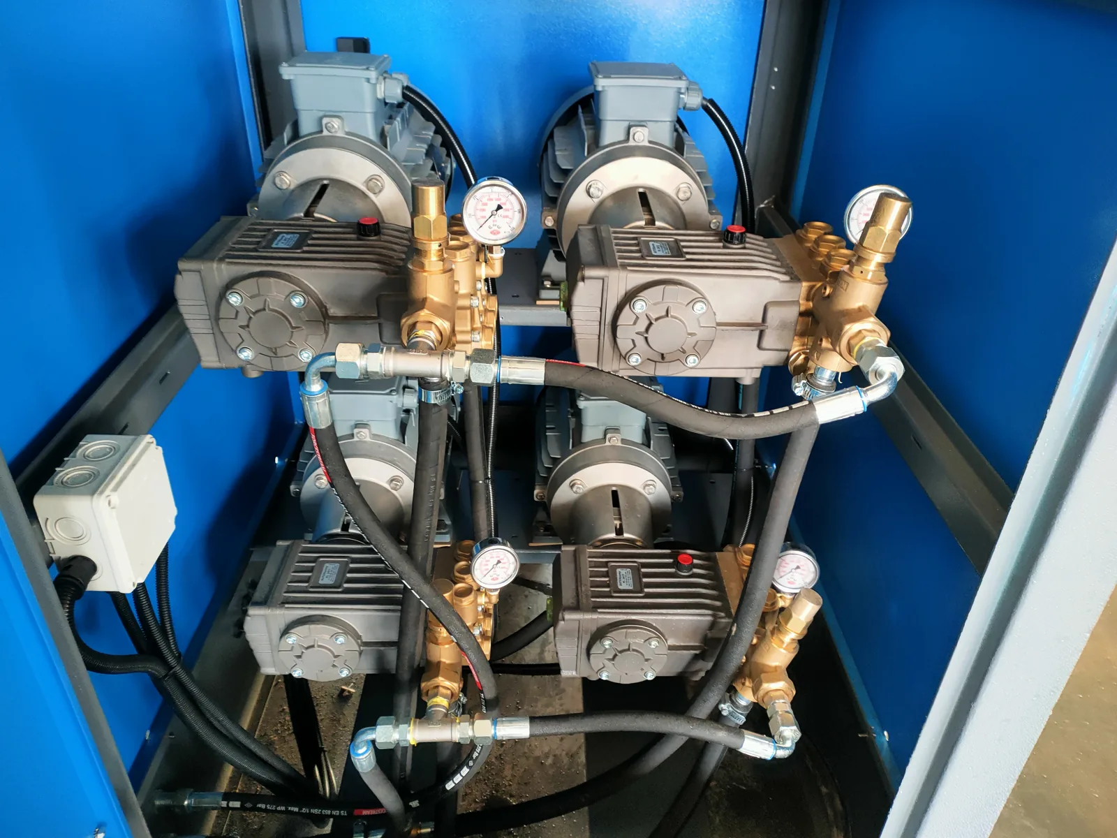 Four high-pressure pump heads inside a pump cabin